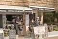 Malgrat de Mar, Catalonia, Spain, August 2018. The man doing the cleaning in the cafe for divers.